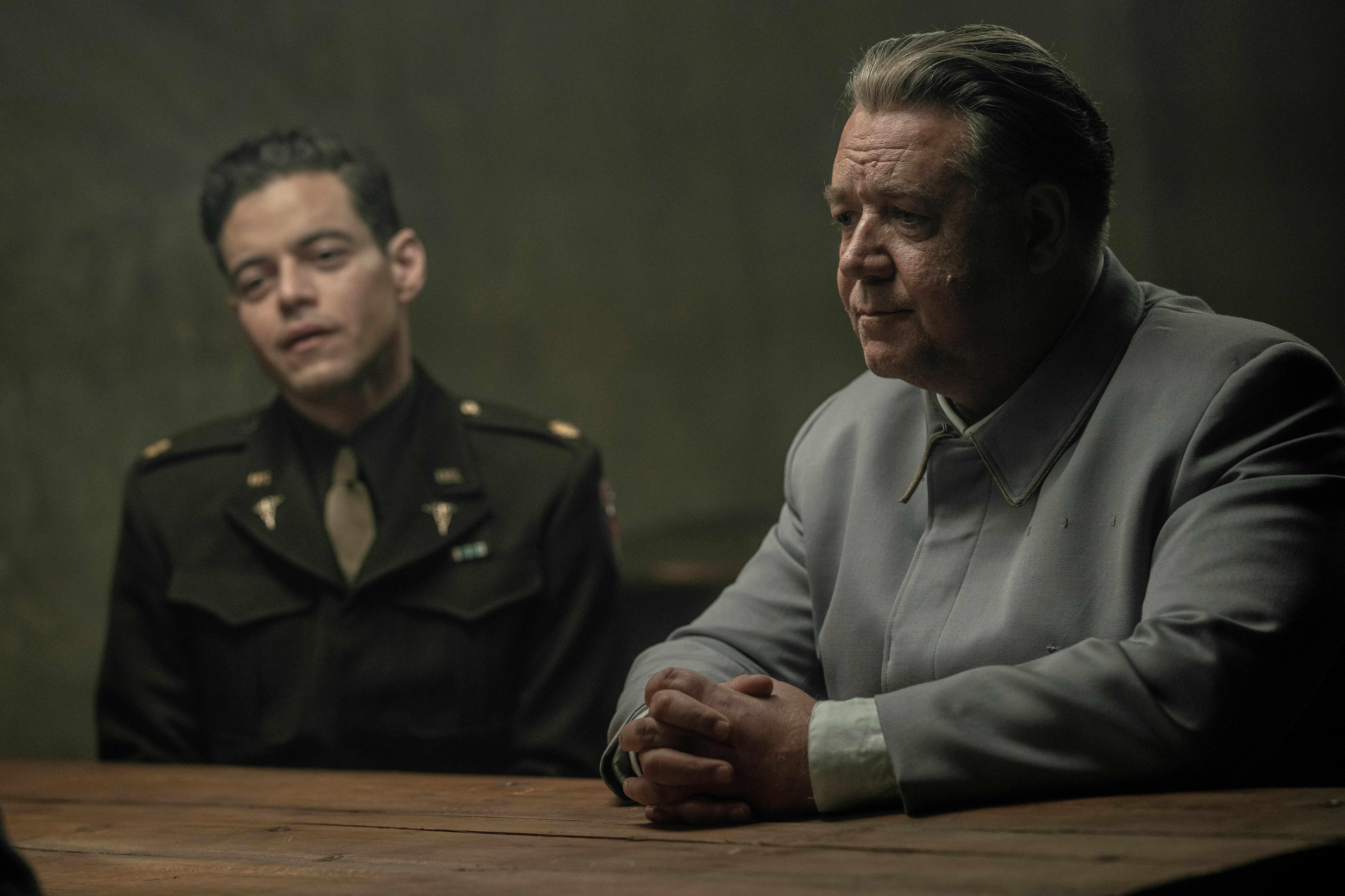 This image released by Sony Pictures Classics shows Rami Malek, left, and Russell Crowe in a scene from “Nuremberg.” (Scott Garfield/Sony Pictures Classics via AP)
