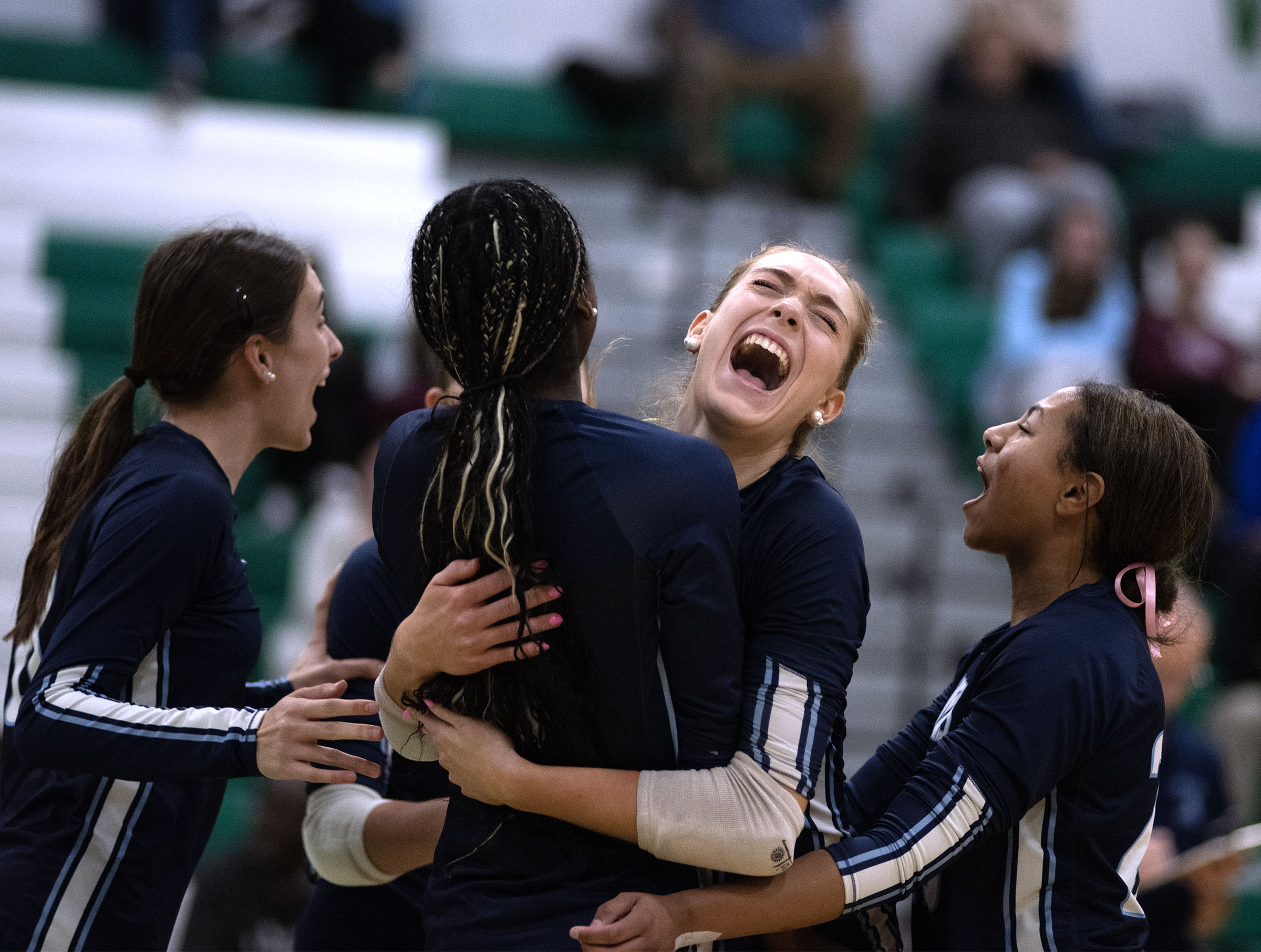 Nov. 11, 2025- Howard celebrates scoring against Arundel in the third match during the Class 3A volleyball state semifinal at Arundel High School. Howard won 3-0.(John Gillis/Freelance)