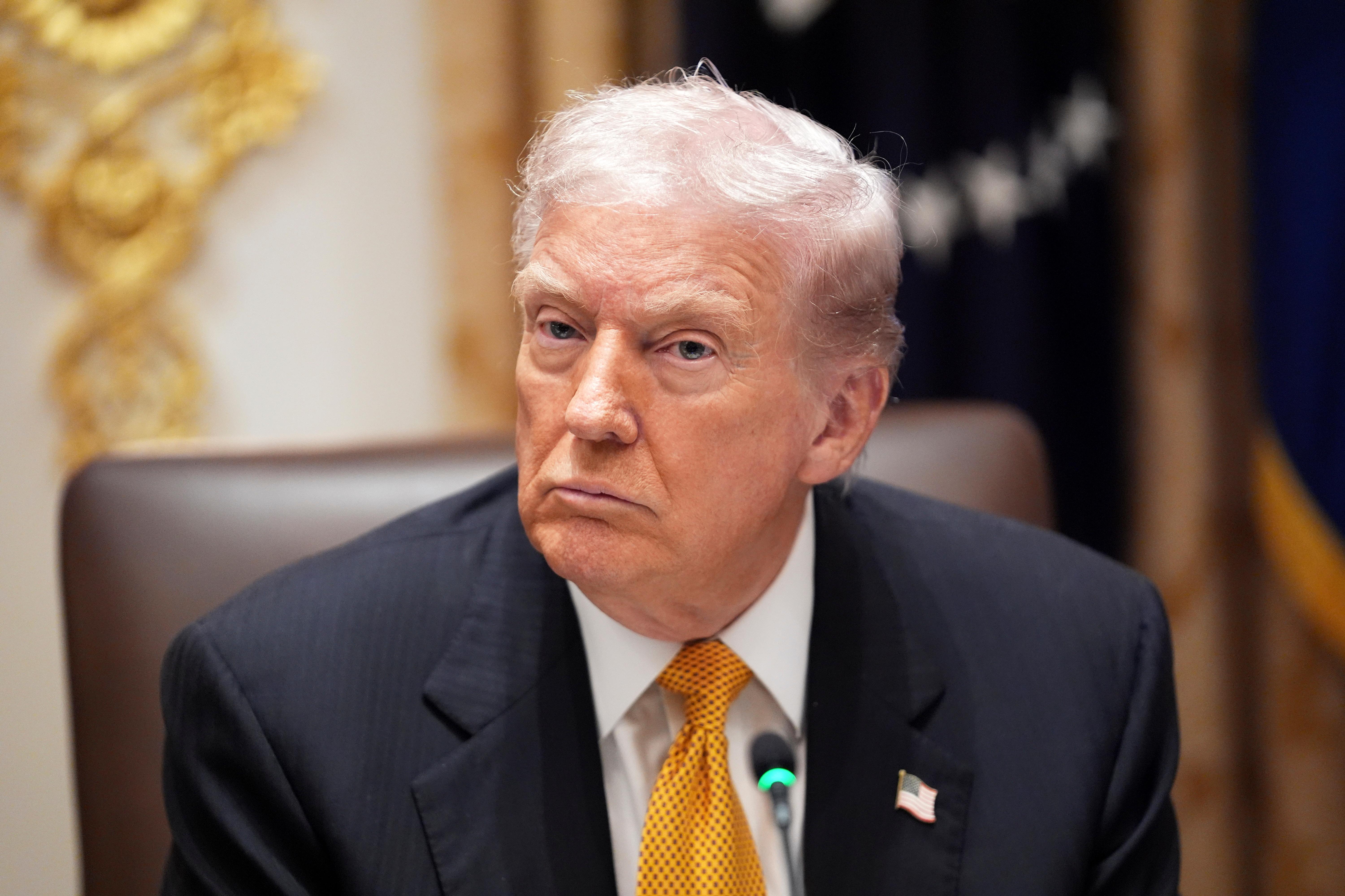 President Donald Trump in the Cabinet Room of the White House on Friday. (Evan Vucci/AP)
